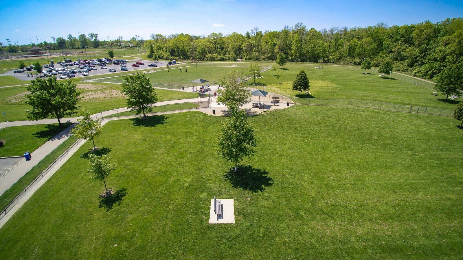 An ariel view of Oak Grove Dog Park shows the fenced in off leash areas for small and large dogs, the covered areas and trees and the walkway around the perimeter. The parks district continues to survey residents to ask for input and requests for future improvements.