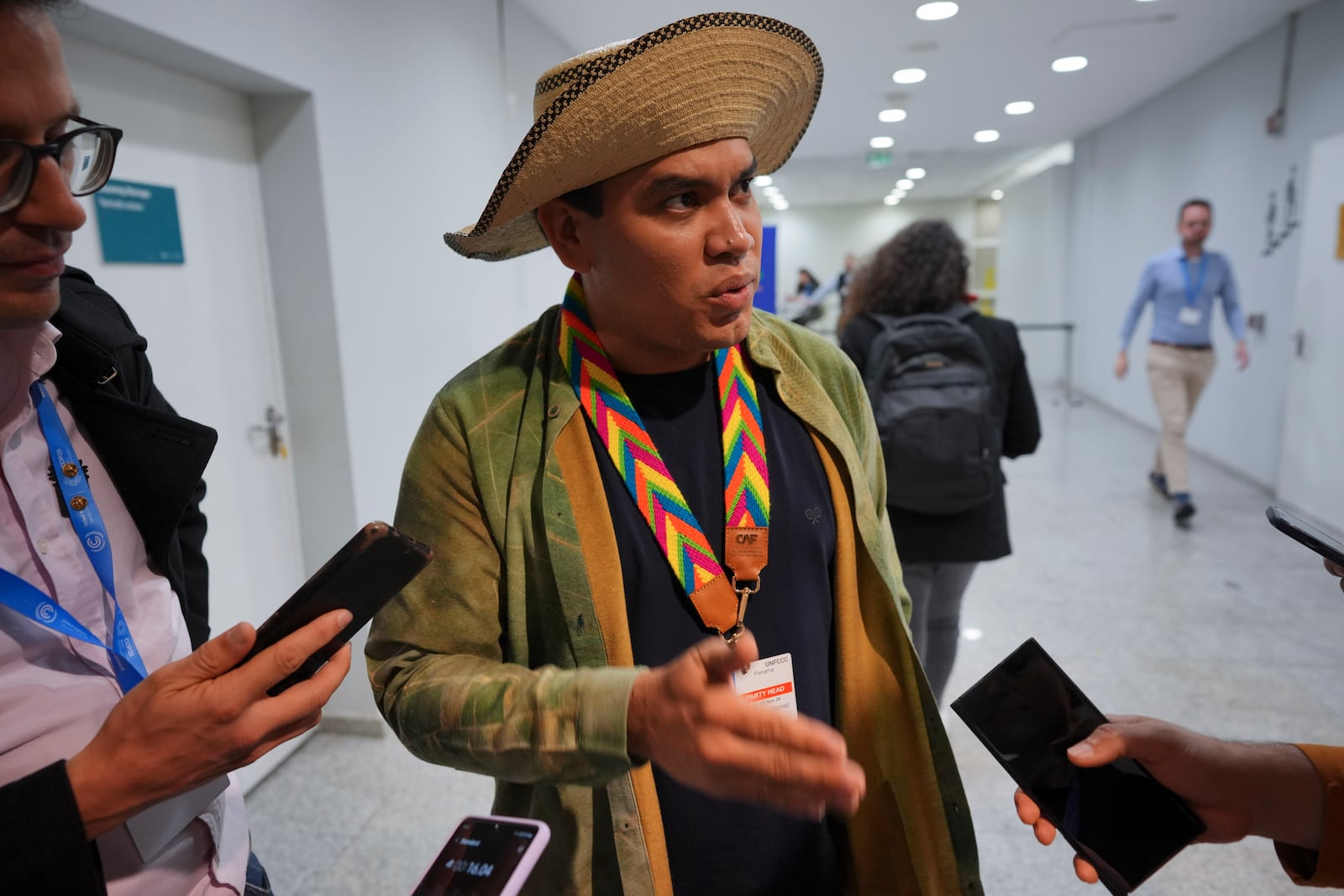 Panama Climate Envoy Juan Carlos Monterrey Gomez speaks to members of the media at the COP29 U.N. Climate Summit, Saturday, Nov. 23, 2024, in Baku, Azerbaijan. (AP Photo/Peter Dejong)