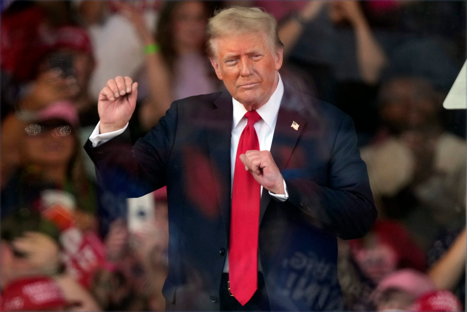 Republican presidential nominee former President Donald Trump dances at a campaign rally in Gastonia, N.C., Saturday, Nov. 2, 2024. (AP Photo/Chris Carlson)