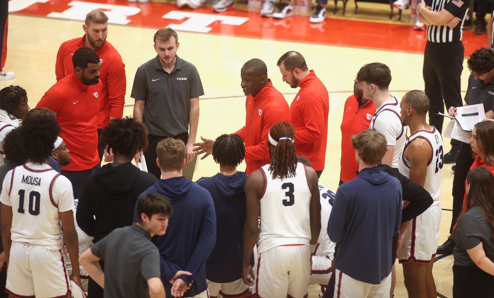 Dayton's Anthony Grant talks to the team during a timeout in the second half against La Salle on Tuesday, Dec. 31, 2024, at UD Arena. David Jablonski/Staff