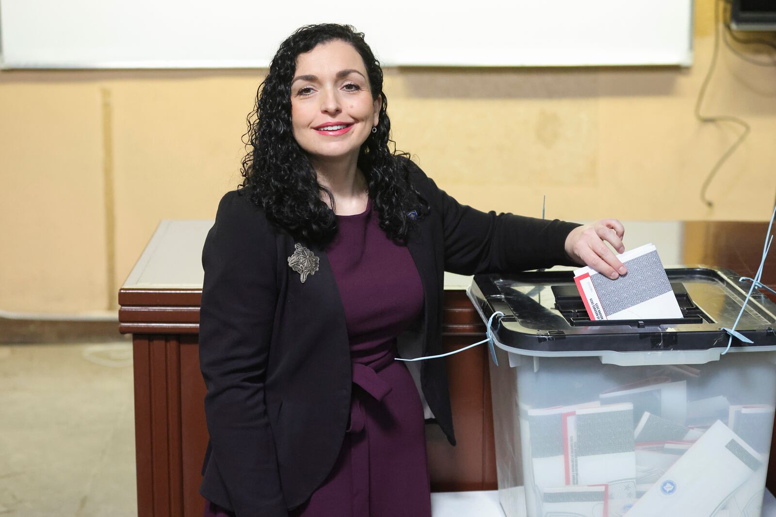 Kosovo's President Vjosa Osmani casts her ballot during parliamentary election in Pristina, Kosovo, Sunday, Feb. 9, 2025. (AP Photo/Vlasov Sulaj)