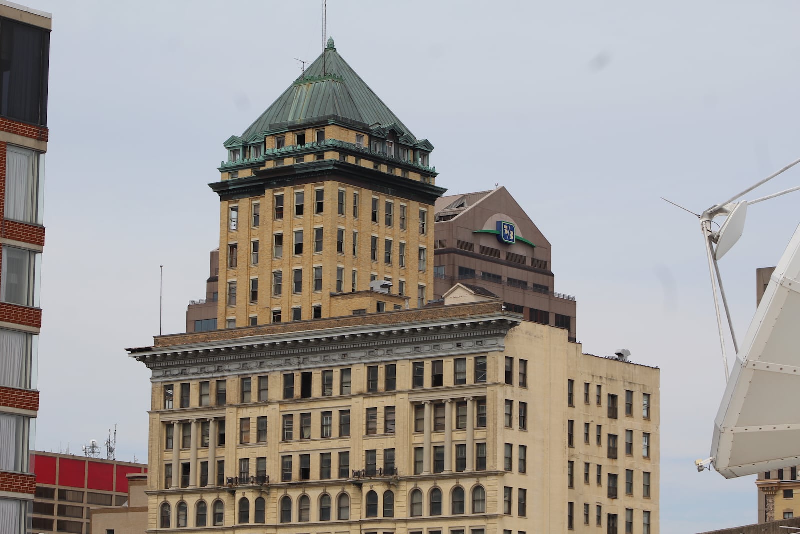 The Centre City building in downtown Dayton plans to seek $5 million in state historic tax credits. But the project previously won an award that it had to forfeit after failing to make progress. CORNELIUS FROLIK / STAFF