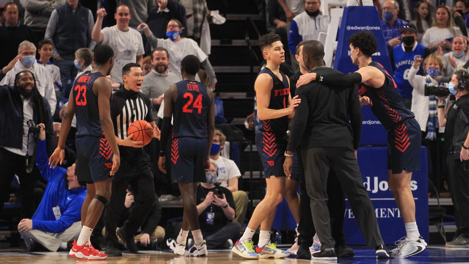 Dayton's Anthony Grant expresses his displeasure after a late-game incident involving former Saint Louis guard Jordair Jett, far left, on Saturday, Feb. 5, 2022, at Chaifetz Arena in St. Louis, Mo. David Jablonski/Staff