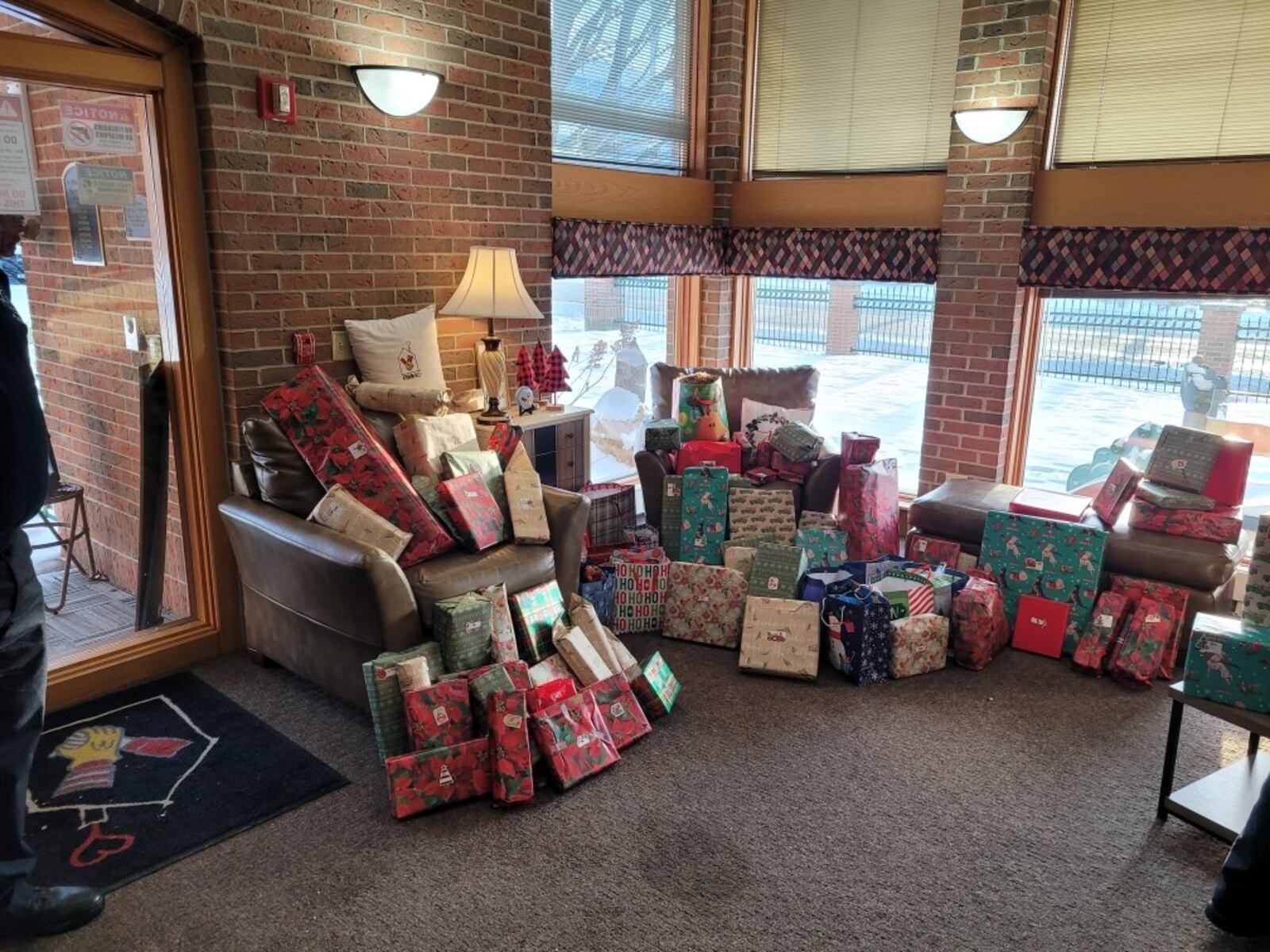 Fireman of Dayton Firefighters Local 136 visited the Ronald McDonald House Charities on Christmas Eve and delivered gifts from a ladder truck and a medical vehicle as part of their “Christmas From The Firehouse”, an annual drive that once again was aided by the horsemen of Dayton Raceway. CONTRIBUTED