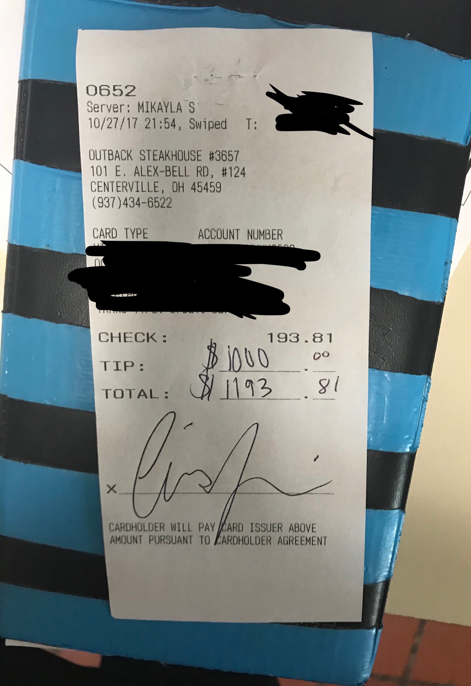 TV personality Chrissy Teigen left Mikayla Scott, a waitress at Outback Steakhouse in Centerville,  a 516 percent tip on a 193.81 bill.  Transaction details have been blacked out.