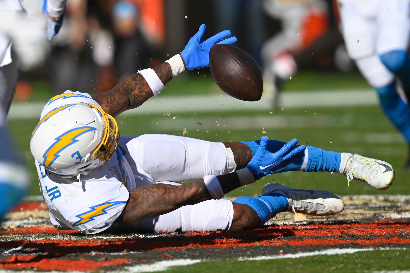 Los Angeles Chargers safety Derwin James Jr. reaches for the ball but can't make the interception against the Cleveland Browns in the first half of an NFL football game Sunday, Nov. 3, 2024, in Cleveland. (AP Photo/David Richard)