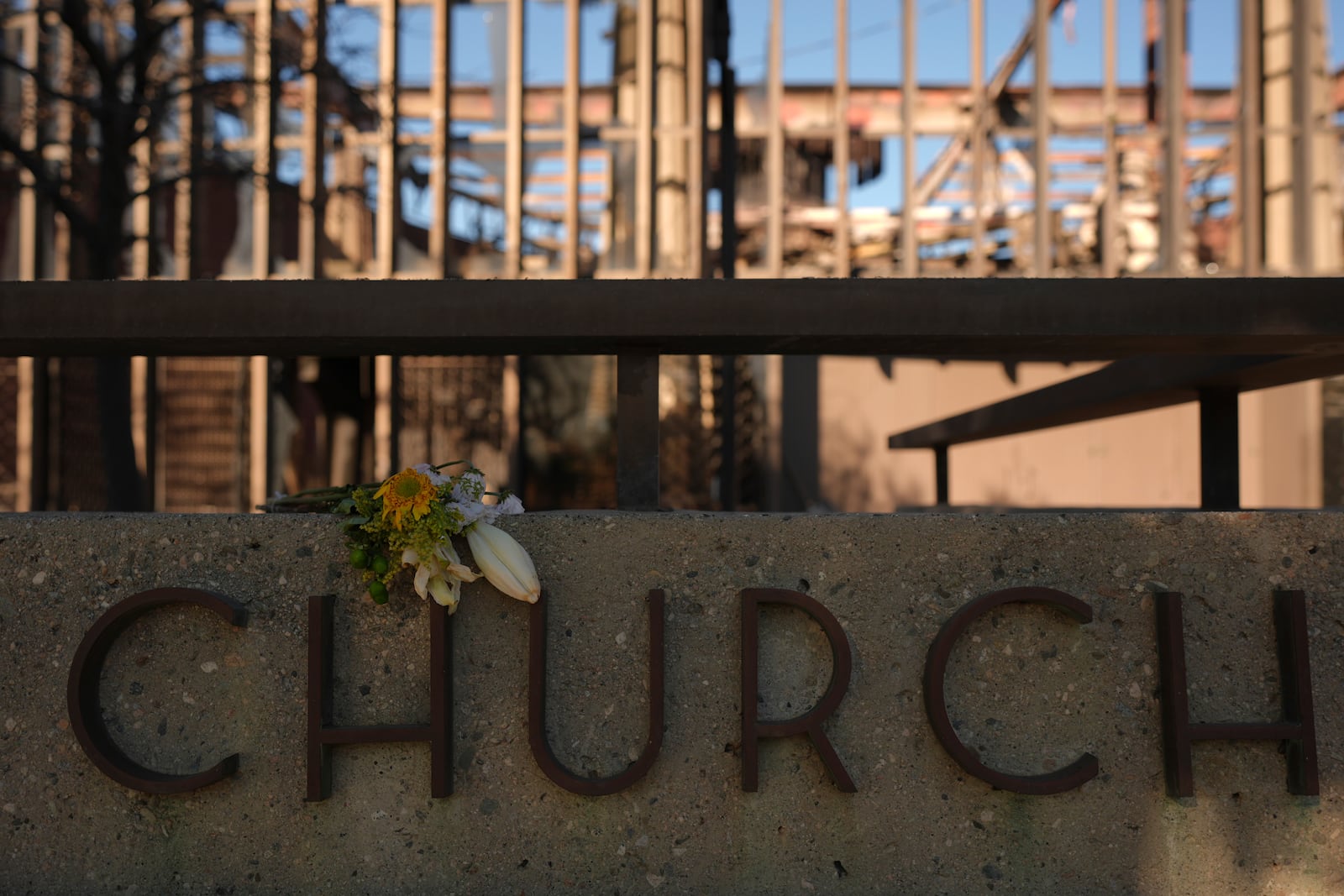 Corpus Christi Church destroyed by the Palisades Fire is seen in Palisades, Calif., Wednesday, Jan. 15, 2025. (AP Photo/Jae C. Hong)