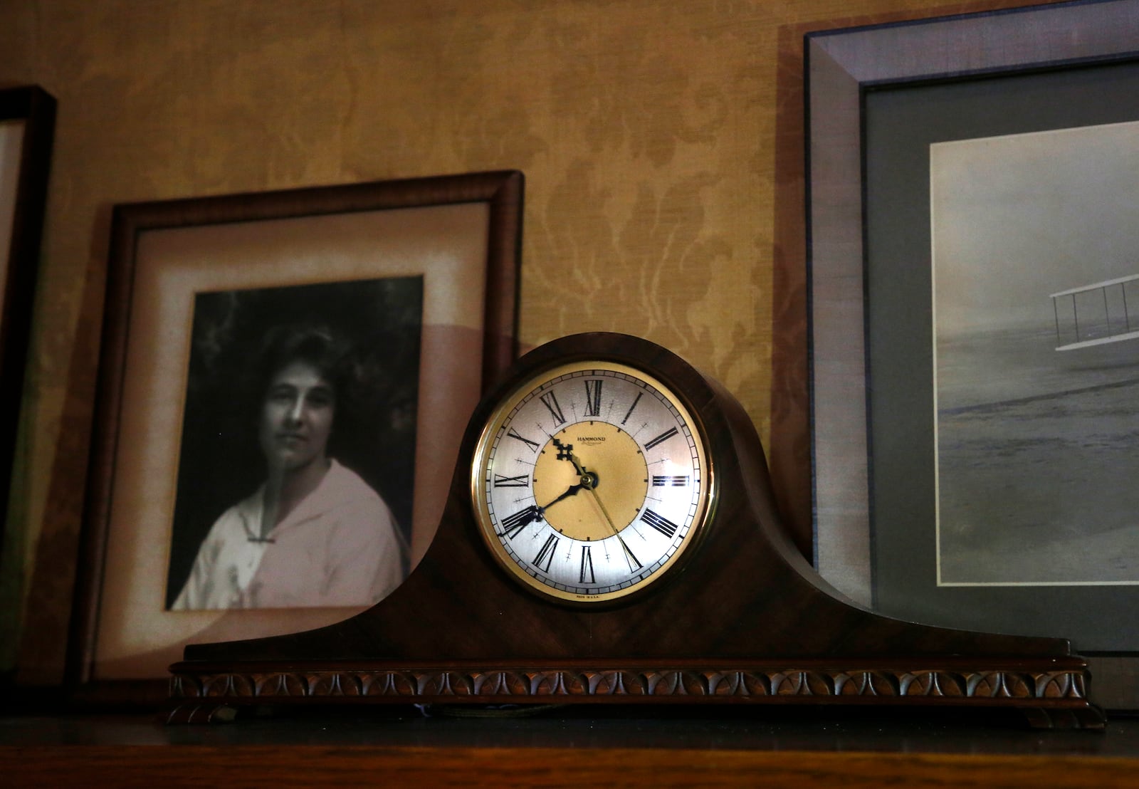 Orville Wright's clock, kept on a shelf in his Hawthorn Hill library, is set to 10:40, the time of his death Jan. 30, 1948. LISA POWELL / STAFF