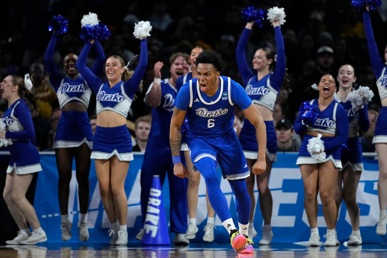 Drake guard Tavion Banks (6) celebrates after making a basket during the second half of a game against Missouri in the first round of the NCAA college basketball tournament, Thursday, March 20, 2025, in Wichita, Kan. (AP Photo/Charlie Riedel)