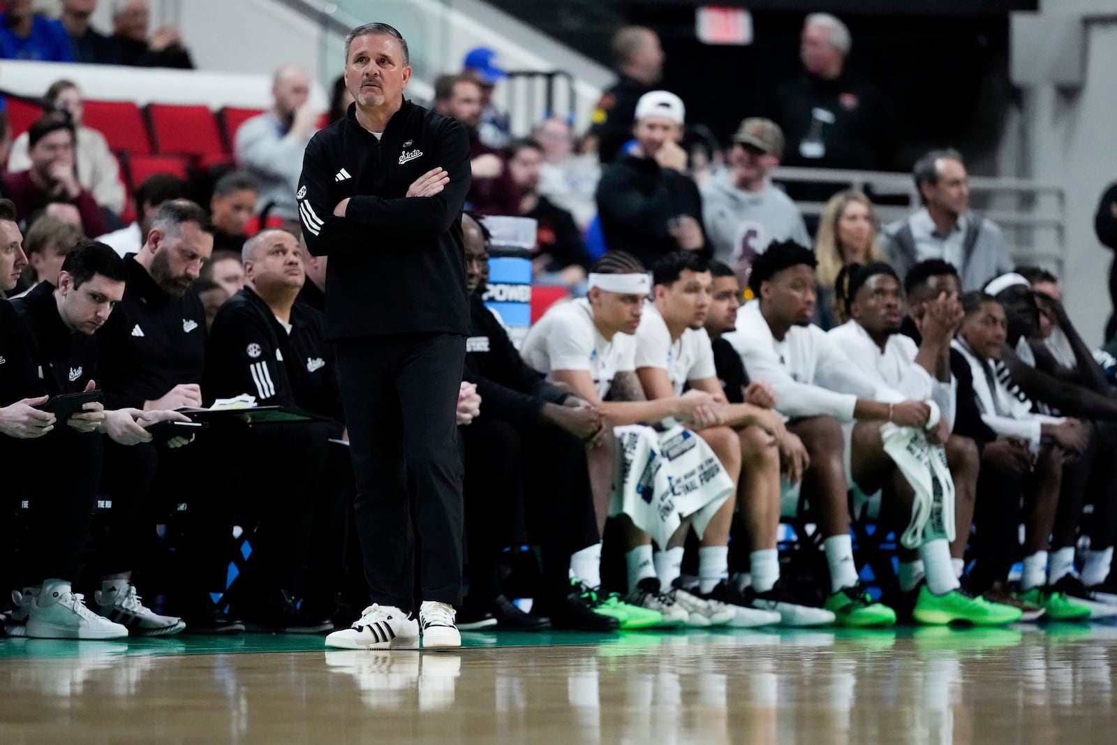 Mississippi State head coach Chris Jans watches during the first half in the first round of the NCAA college basketball tournament against Baylor, Friday, March 21, 2025, in Raleigh, N.C. (AP Photo/Stephanie Scarbrough)