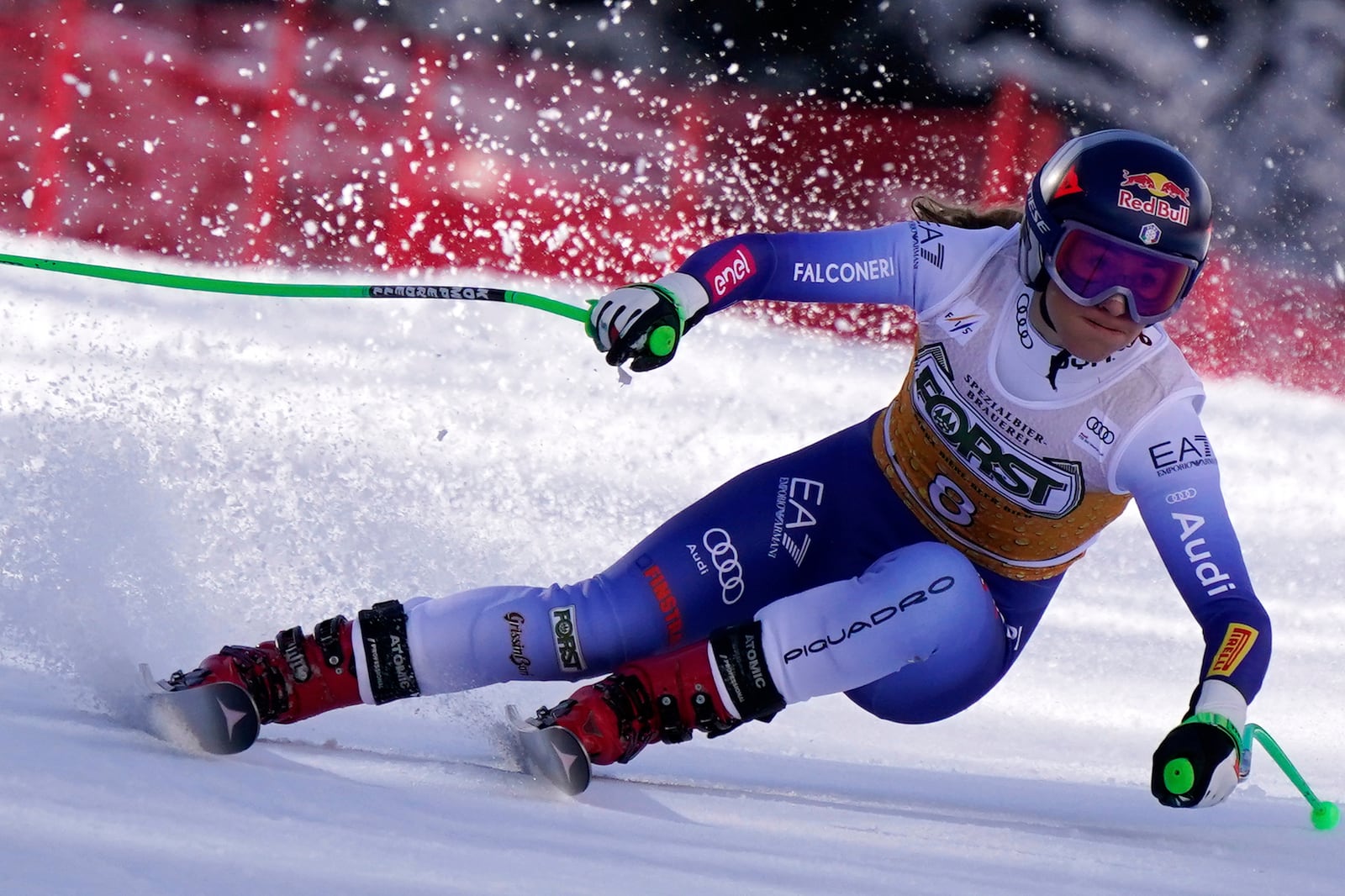 Italy's Sofia Goggia speeds down the course of an alpine ski, women's World Cup super G race, in La Thuile, Italy, Thursday, March 13, 2025. (AP Photo/Piermarco Tacca)