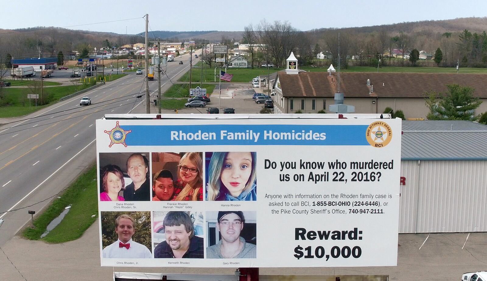 A billboard seeking information remains posted 300 feet from the Pike County Sheriff's Office two years after the murder of 8 Rhoden family members in rural Pike County. The crime remains unsolved.      TY GREENLEES / STAFF