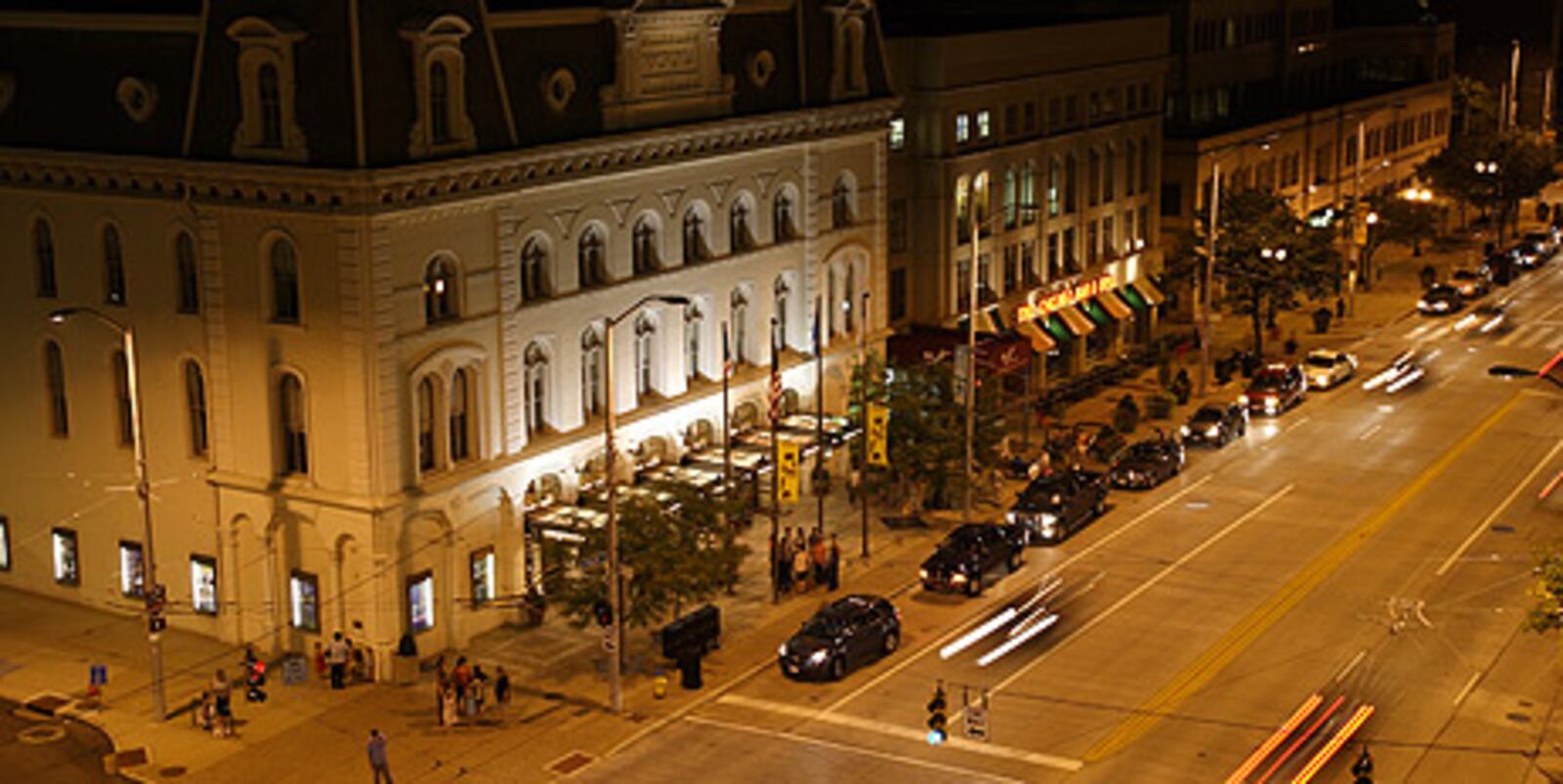 The Victoria Theatre building dominates this view from the top of the PMI parking garage on Main Street during First Friday in downtown Dayton, in this Friday, August 5, 2011 file photo.