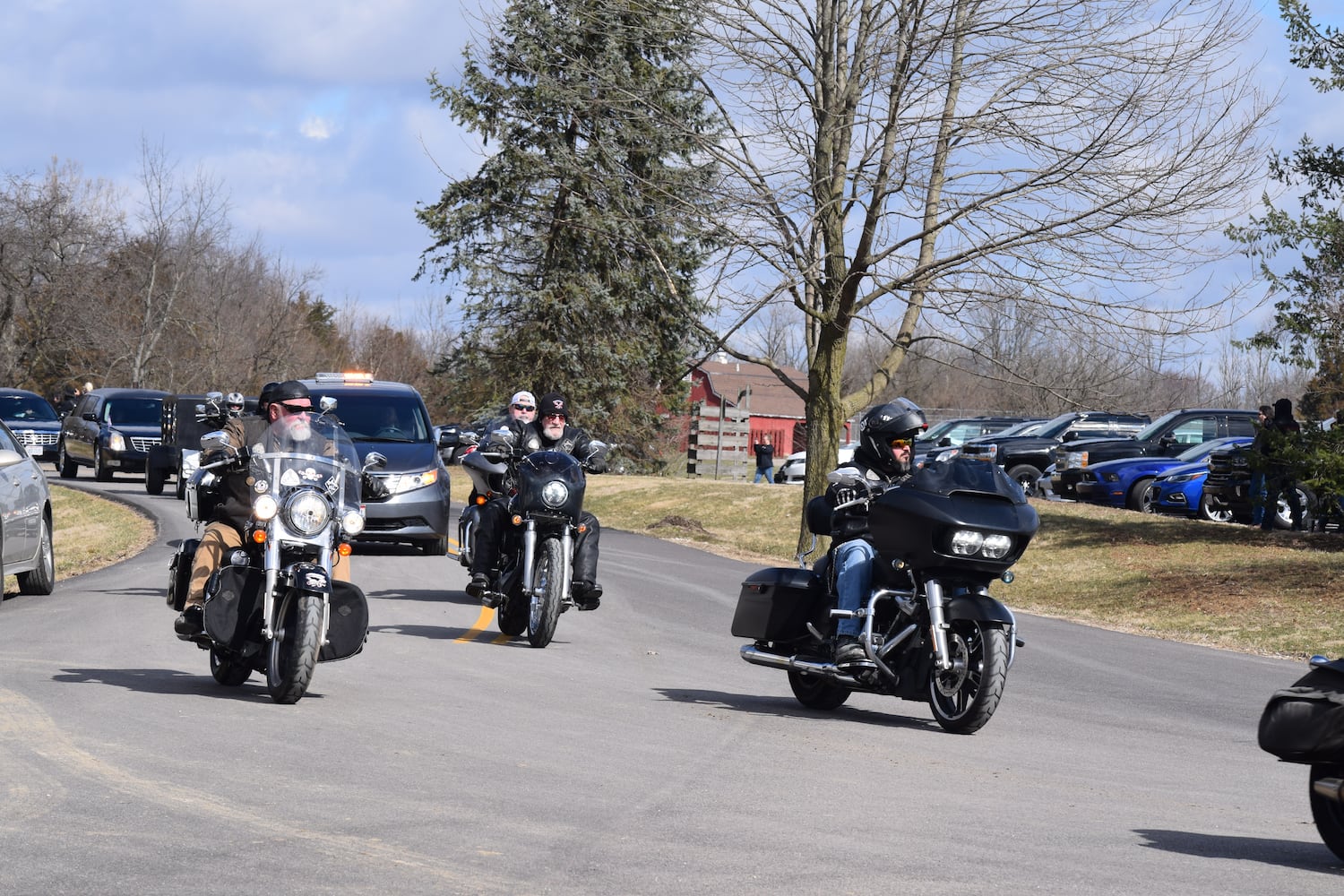 PHOTOS: Thousands of Outlaws attend motorcycle gang leaders funeral at Montgomery County Fairgrounds.