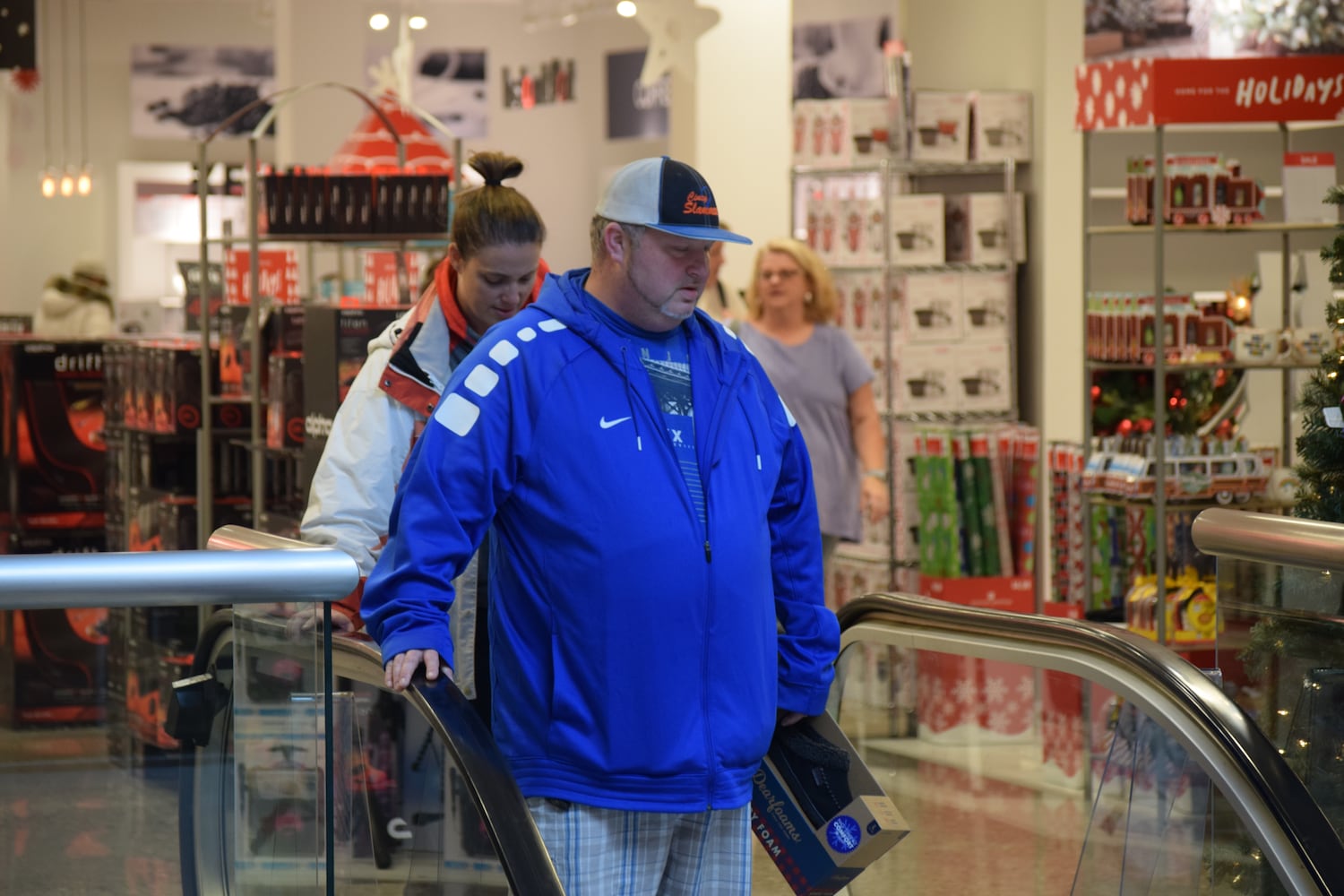 PHOTOS: Hundreds like up outside JCPenney for doorbusters, coupons