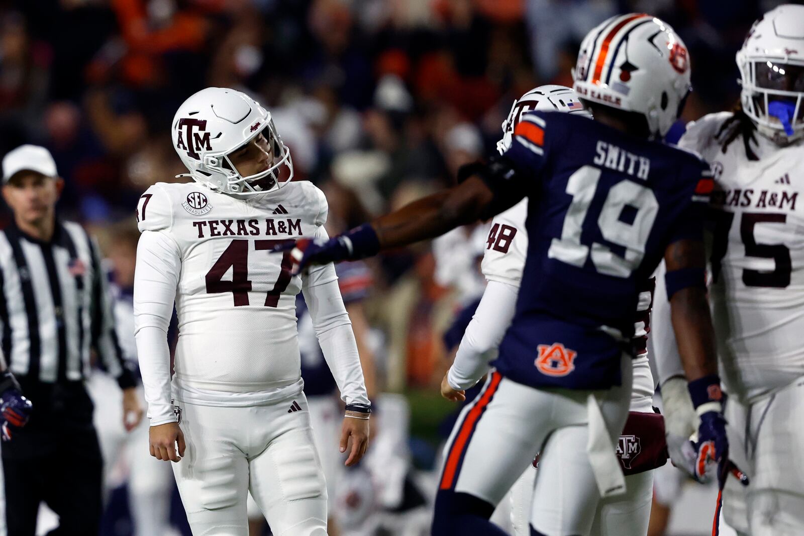 Texas A&M place kicker Randy Bond (47) reacts after missing a field goal against Auburn during the first half of an NCAA college football game, Saturday, Nov. 23, 2024, in Auburn, Ala. (AP Photo/Butch Dill)