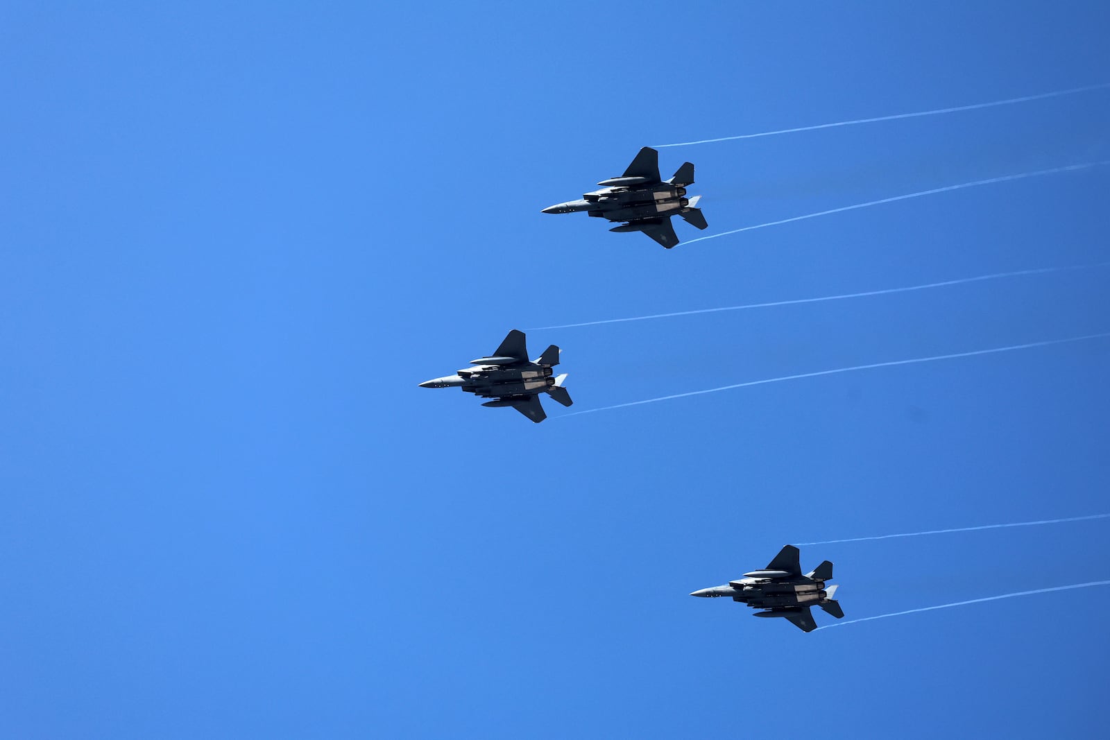 South Korean Air Force F-15K fighter jets fly during the joint military drill between South Korea and the United States at Seungjin Fire Training Field in Pocheon, South Korea, Thursday, March 6, 2025. (Yonhap via AP)