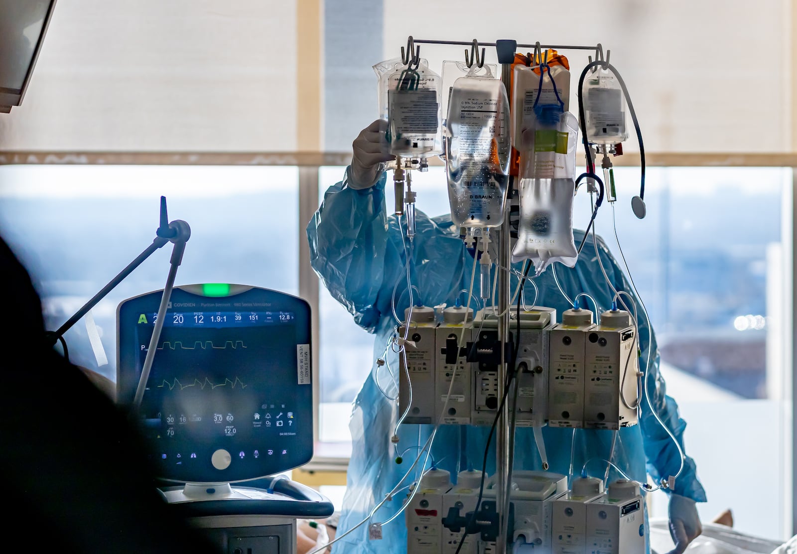 Miami Valley Hospital medical staff working in full PPE gear in a COVID-19 patient room.  CONTRIBUTED BY PREMIER HEALTH