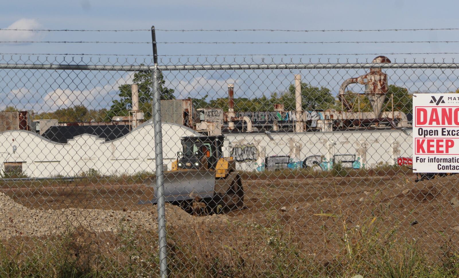 Construction equipment at work at Abbey Avenue and U.S. 35. The Dayton Metro Library is constructing its new West Branch library on the site, part of the former Delphi property. CORNELIUS FROLIK / STAFF