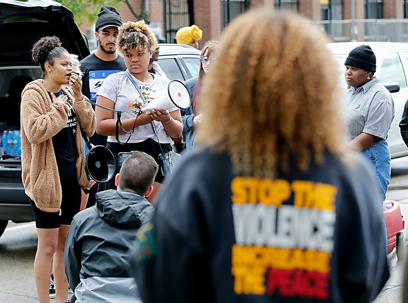 PHOTOS: Demonstrators rally for justice in Beavercreek