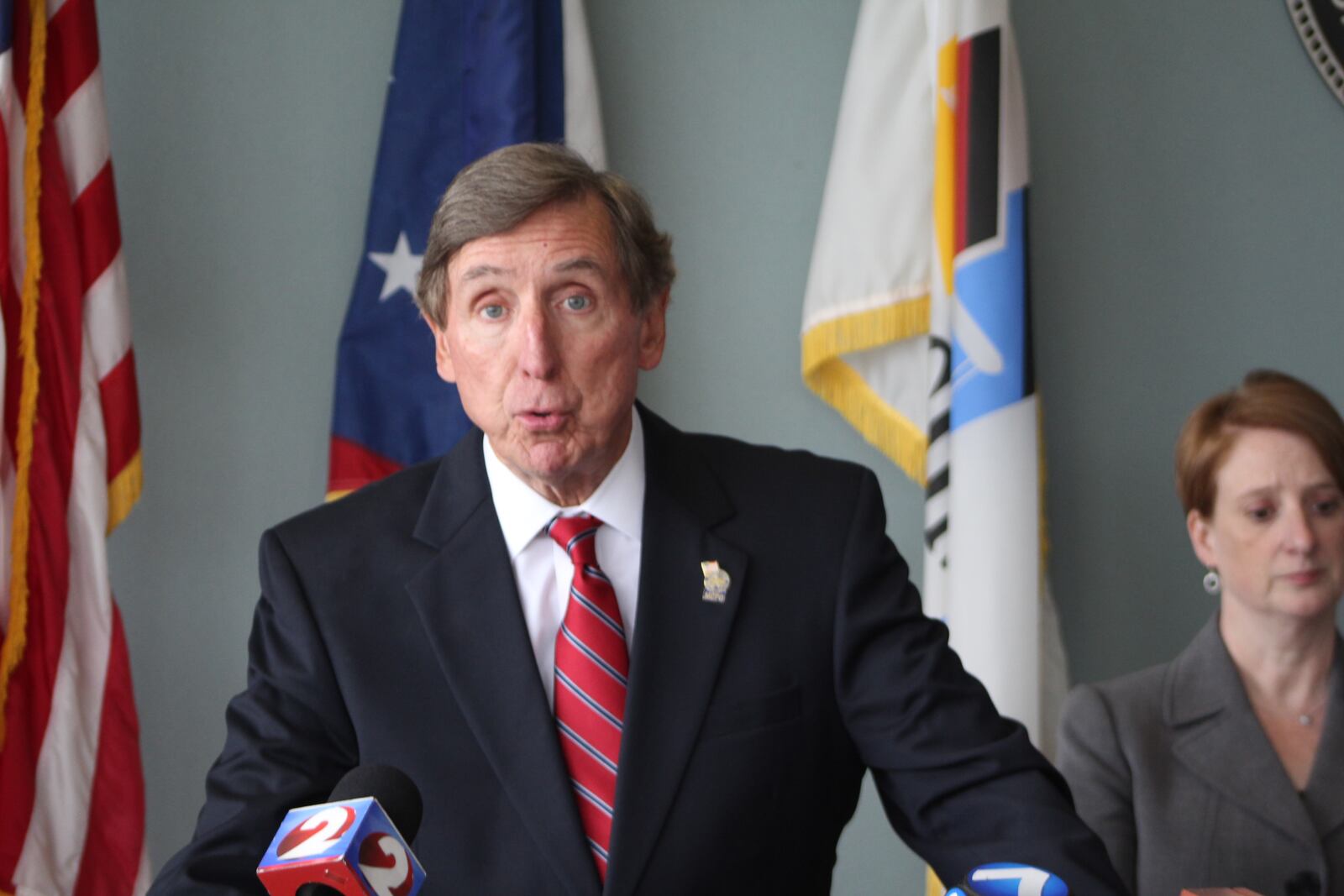 Montgomery County Prosecutor Mat Heck Jr. and Eric Claypoole with the violent crimes bureau at a Monday press conference announcing the indictment against Raymond Walters. CORNELIUS FROLIK / STAFF