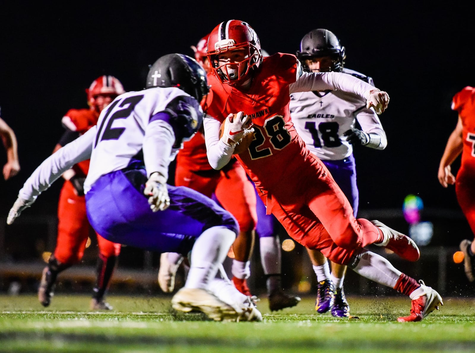 Madison’s Jake Phelps takes off for a touchdown during Saturday night’s 50-6 win over Cincinnati Hills Christian Academy in a Division V, Region 20 playoff semifinal at Lakota East. NICK GRAHAM/STAFF