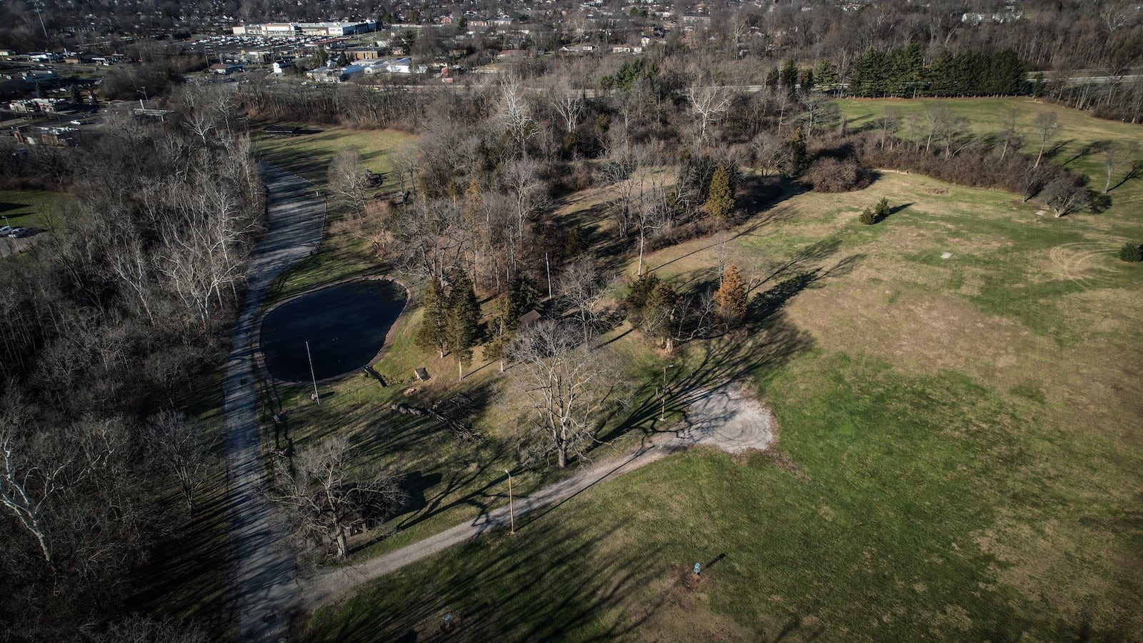 Sycamore Trails Park in Miamisburg will upgrade its park. Improvements will affect the pond, basketball court and park shelter. Jim Noelker/Staff