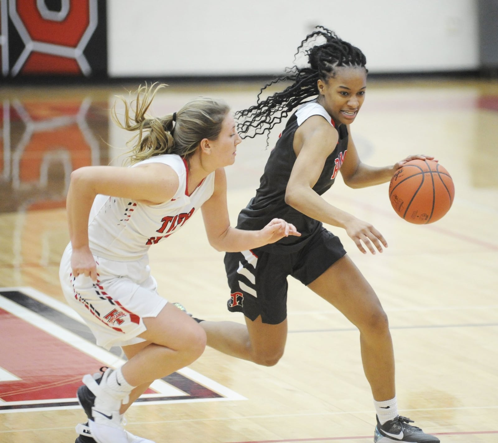 Trotwood’s Sha’mya Leigh (with ball) is guarded by Tipp’s Jillian Brown. Trotwood-Madison defeated host Tippecanoe 37-35 in girls high school basketball on Thursday, Jan. 24, 2019. MARC PENDLETON / STAFF