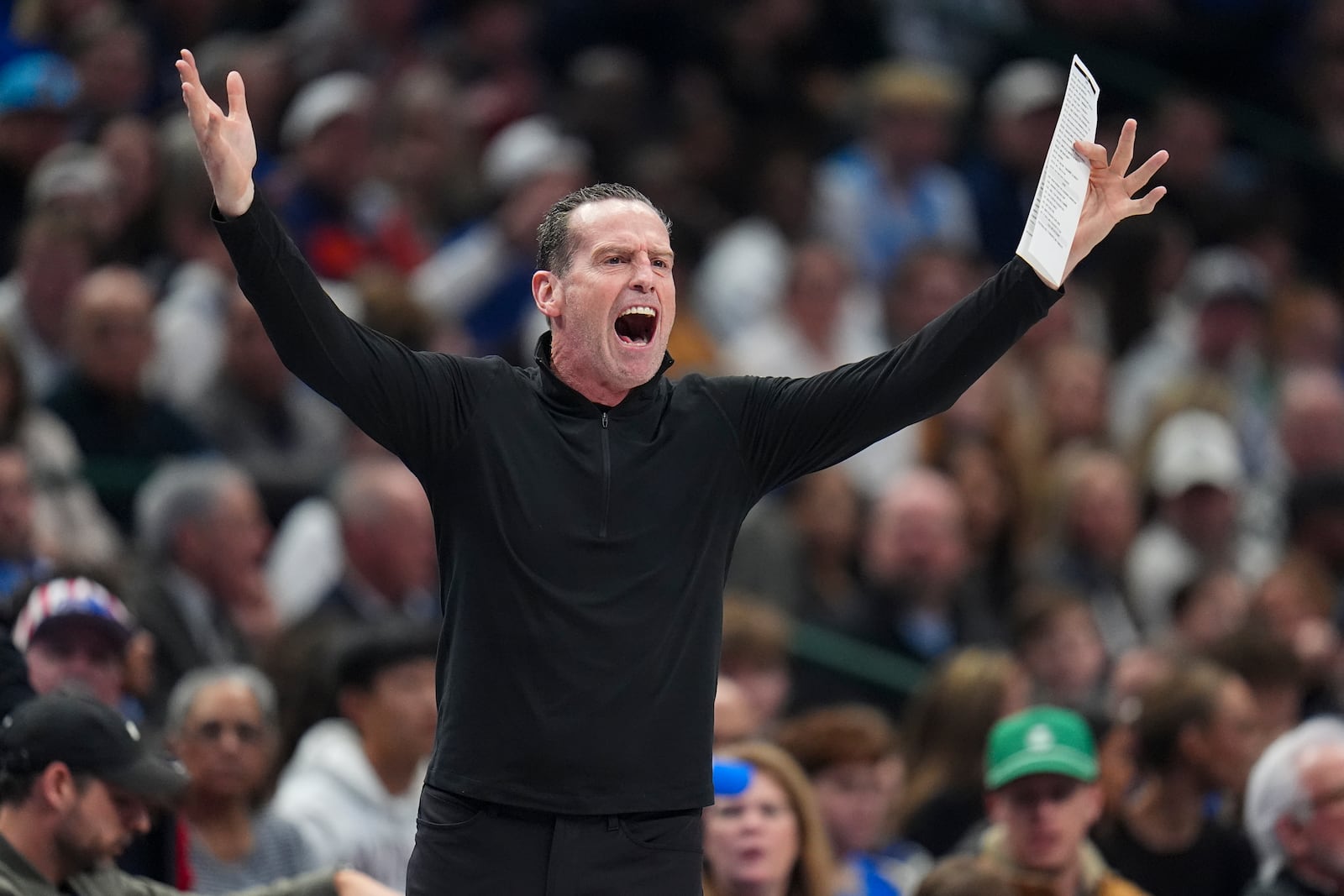 Cleveland Cavaliers head coach Kenny Atkinson reacts during the first half of an NBA basketball game against the Dallas Mavericks, Friday, Jan. 3, 2025, in Dallas. (AP Photo/Julio Cortez)