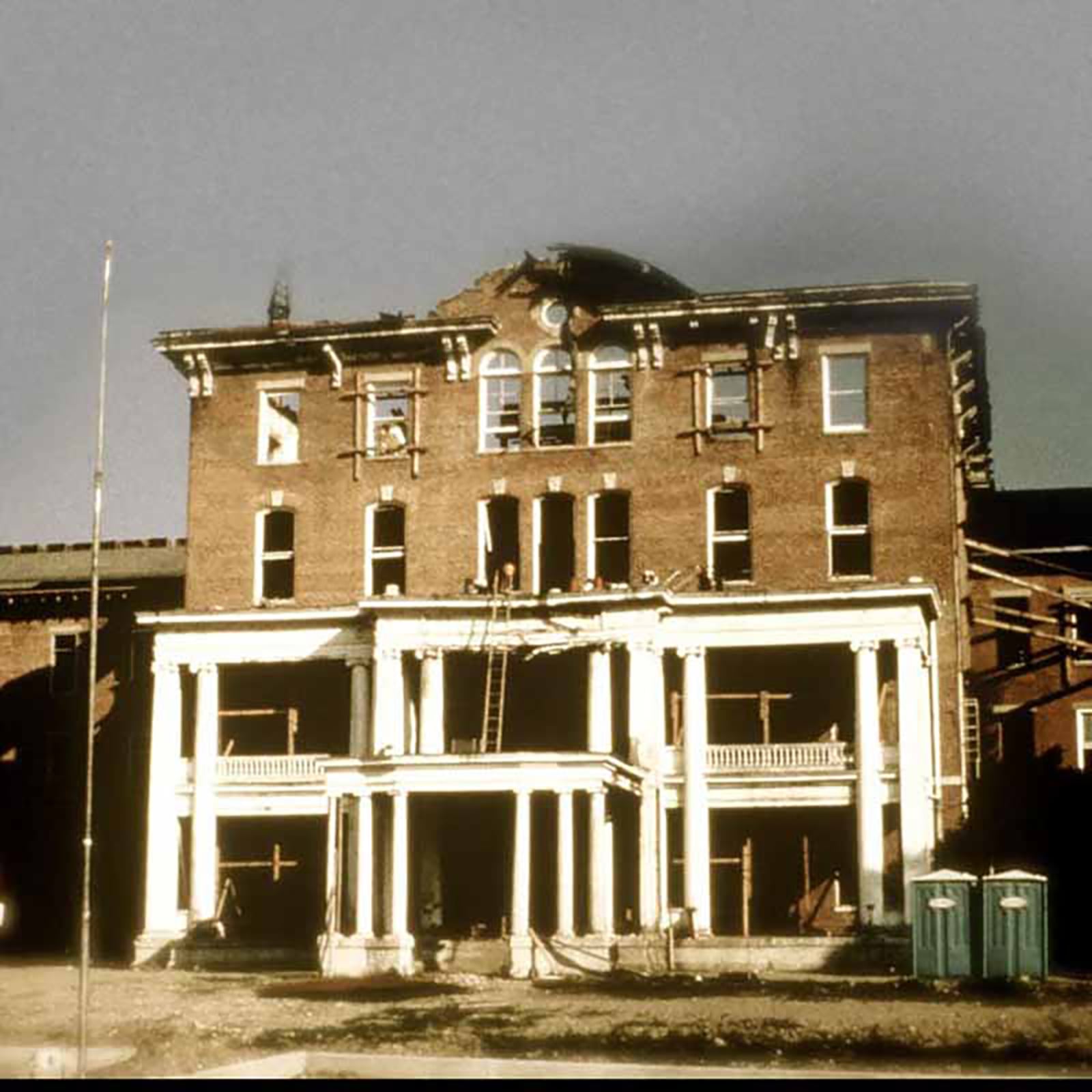 the building - once a state hospital - at 10 Wilmington Avenue in Dayton - was in disrepair and on the city's list to be demolished before a group of Daytonians hired Barry Humphries to help redevelop the property as Ten Wilmington Place, which opened in 1986.