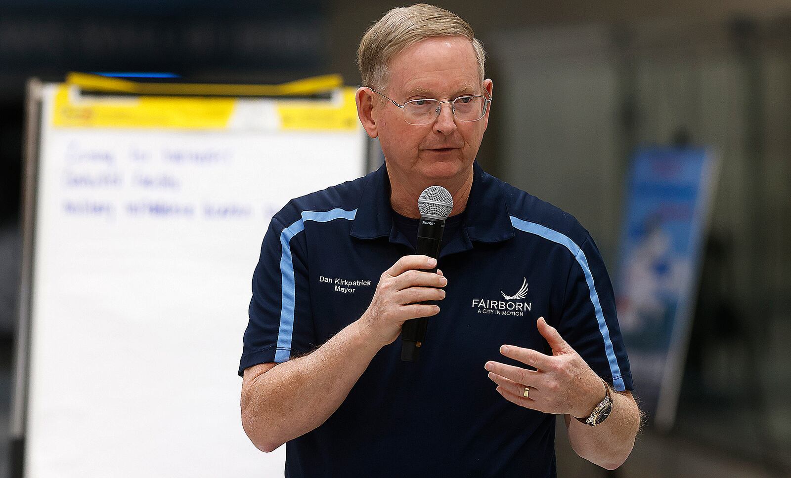 Fairborn Mayor Dan Kirkpatrick with other city leaders and residents discuss the future of marijuana sales during a public forum Monday night, Jan. 28, 2025, at Fairborn High School. MARSHALL GORBY\STAFF