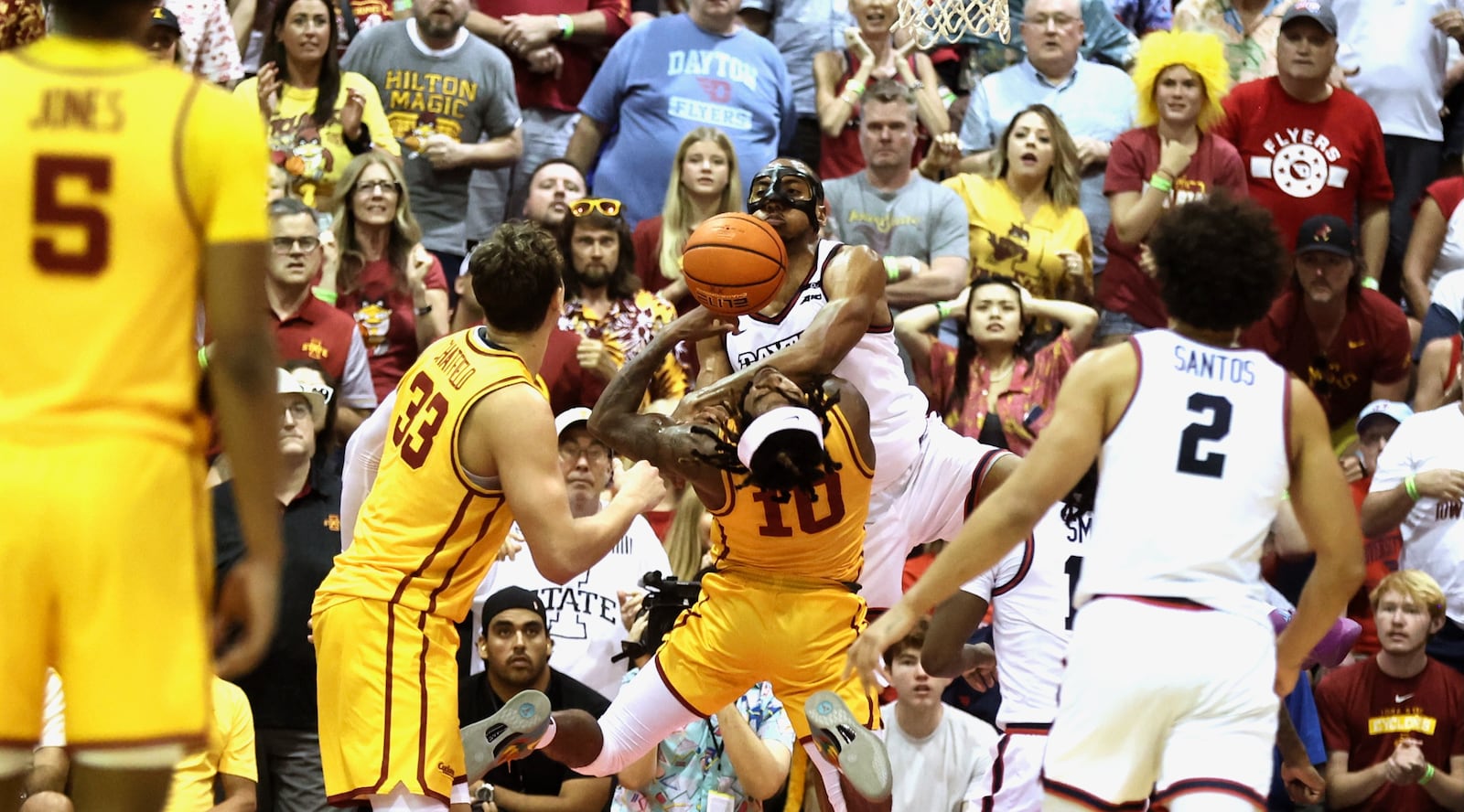 Dayton's Zed Key fouls Iowa State's Keshon Gilbert in the final minute in the consolation round of the Maui Invitational on Monday, Nov. 25, 2024, at the Lahaina Civic Center. Zey was called for a flagrant foul. David Jablonski/Staff