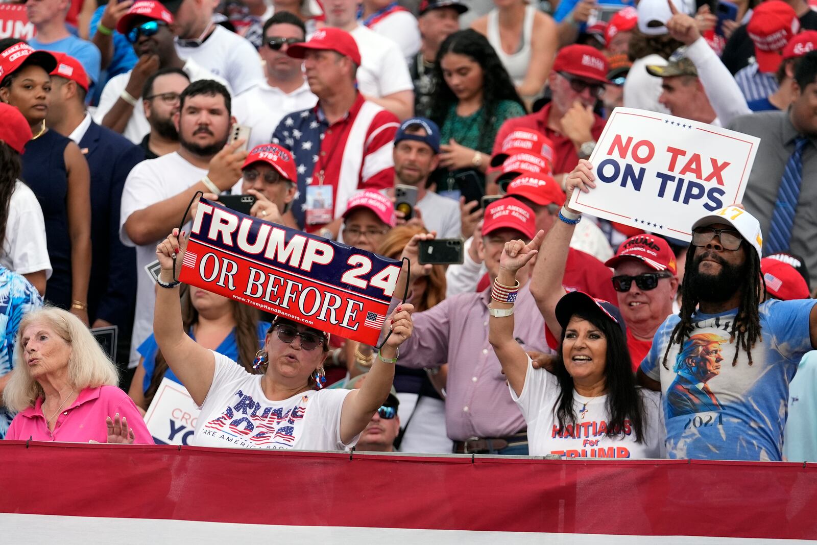 FILE - Supporters arrive before Republican presidential candidate former President Donald Trump speaks at a campaign rally, July 9, 2024, in Doral, Fla. (AP Photo/Rebecca Blackwell, File)