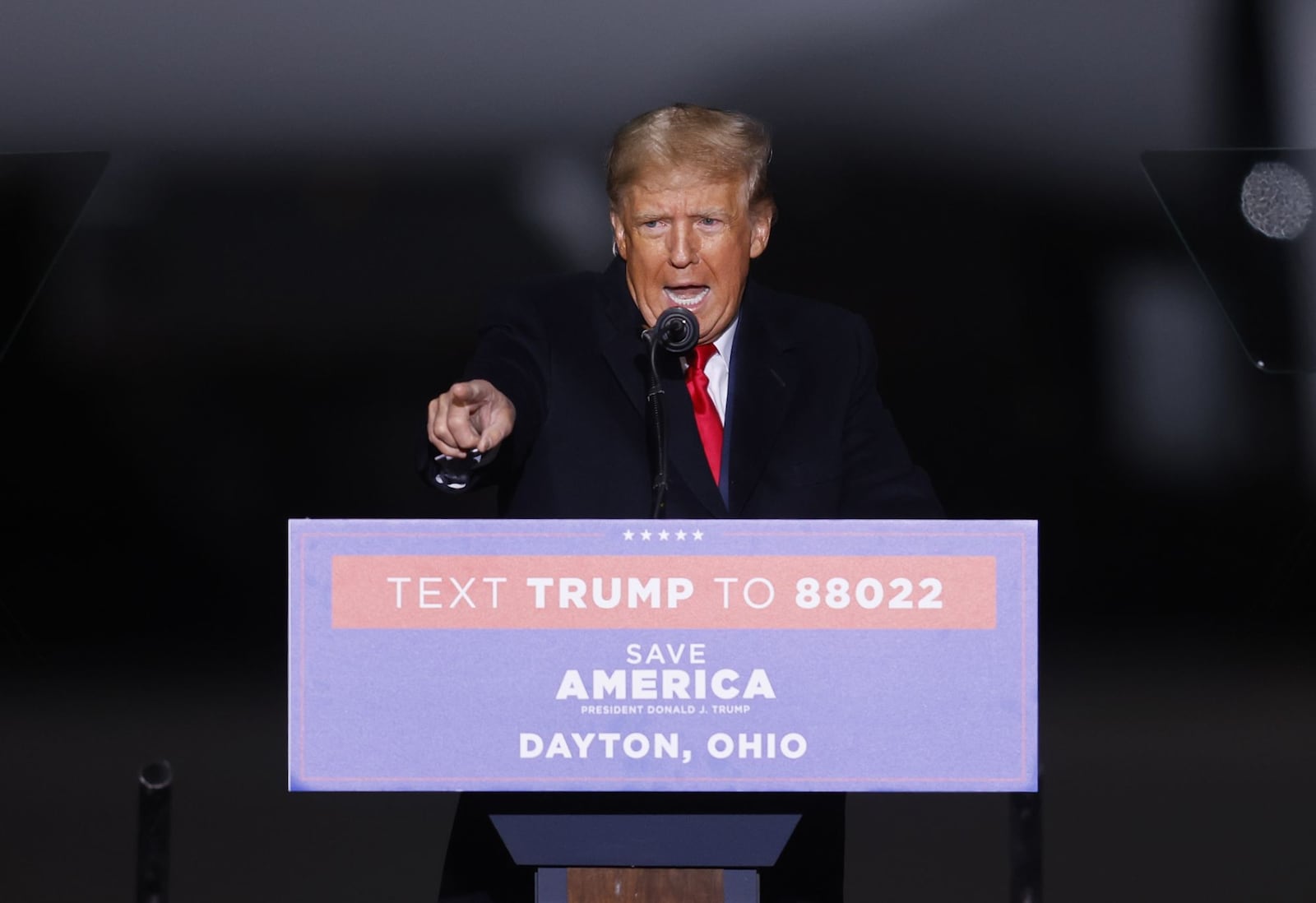 Donald Trump speaks to the crowd during rally Monday, Nov. 7, 2022 at Dayton International Airport. NICK GRAHAM/STAFF