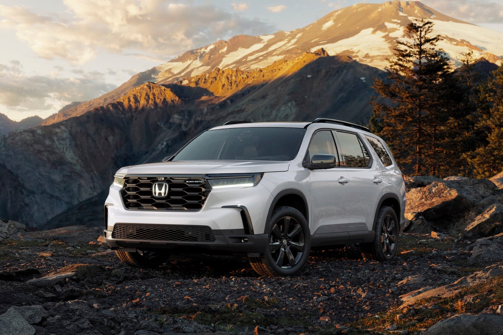 This photo provided by Honda shows the 2025 Pilot. The Pilot is a no-nonsense SUV that scores well on interior comfort and space. (Courtesy of American Honda Motor Co. via AP)