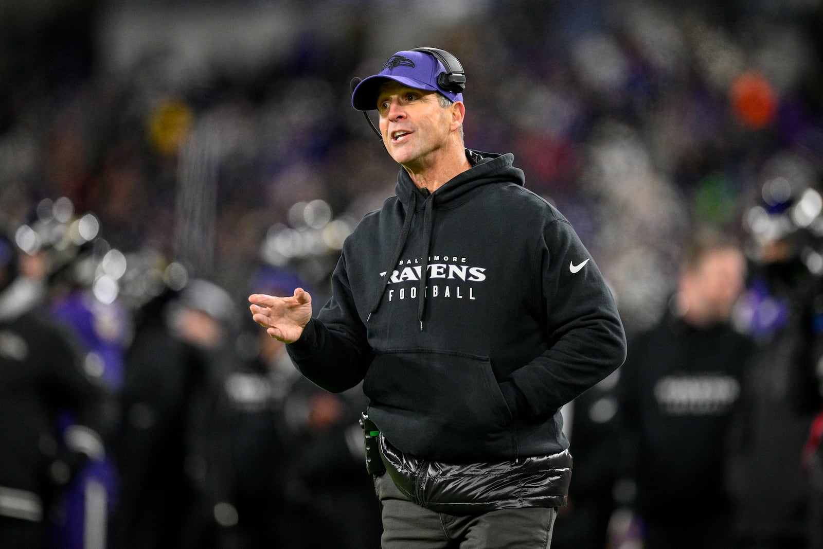 Baltimore Ravens head coach John Harbaugh talks to an official during the second half of an NFL football game against the Pittsburgh Steelers, Saturday, Dec. 21, 2024, in Baltimore. (AP Photo/Nick Wass)