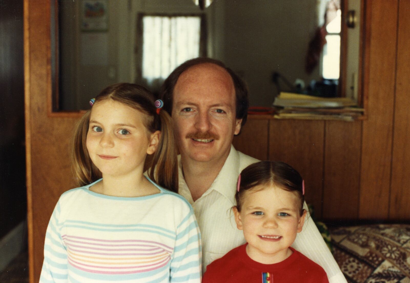 Mickey Lozan was a single dad in the 1980s raising his two young daughters, Arianna (left) and Shonna. Both girls went on to get masters degrees and are successful today. CONTRIBUTED