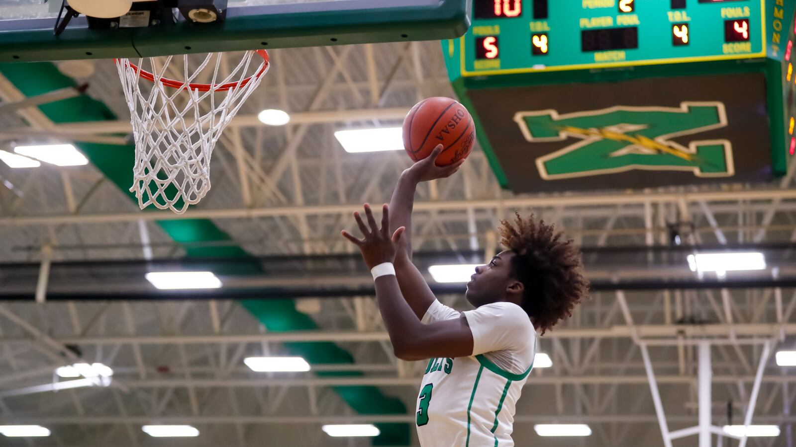 Northmont High School junior Da'Lin Wilkins shoots the ball during their game on Friday night at the Northmont High School Thunderdome. The Thunderbolts won 54-50. Michael Cooper/CONTRIBUTED