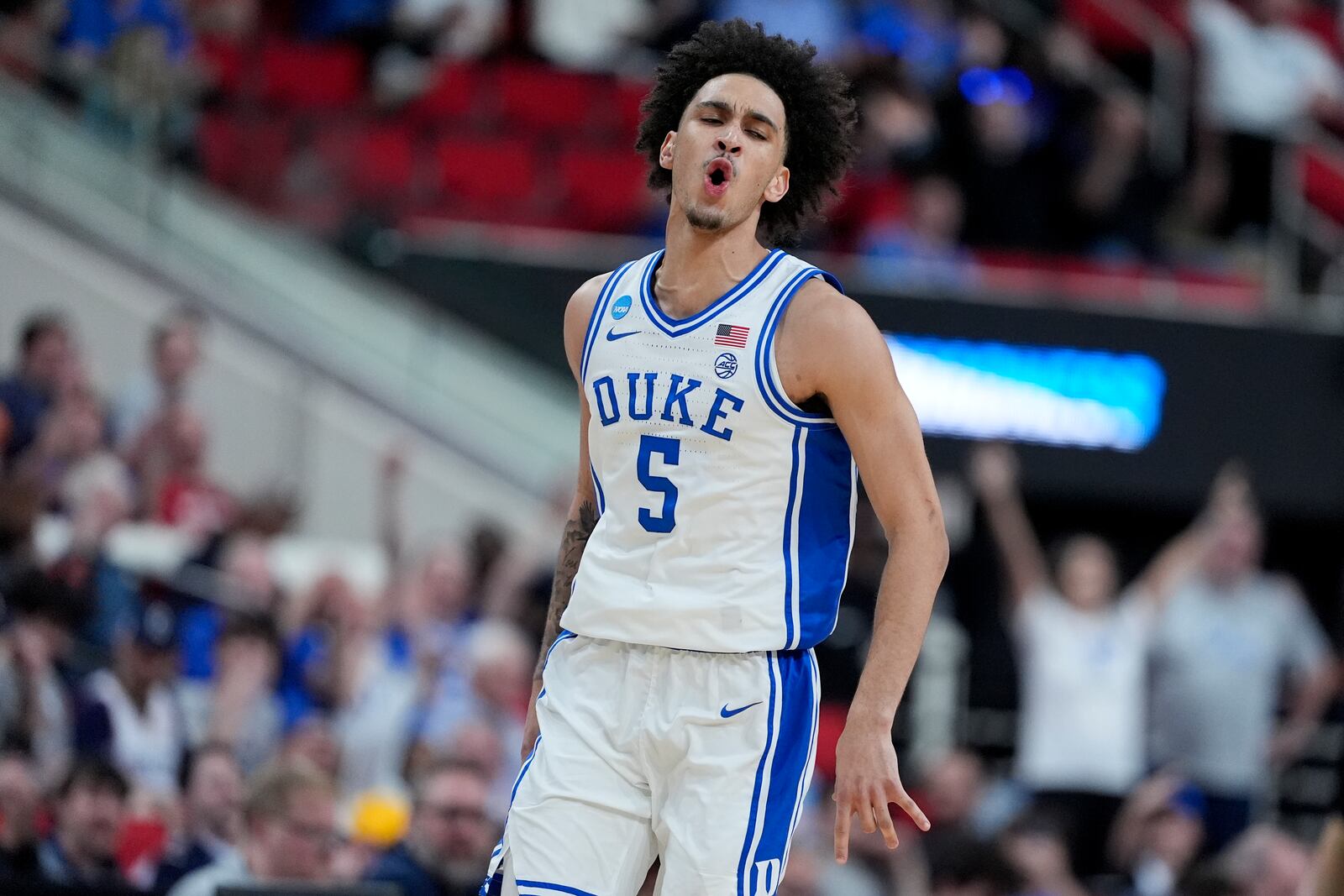 Duke guard Tyrese Proctor celebrates after scoring against Baylor during the second half in the second round of the NCAA college basketball tournament, Sunday, March 23, 2025, in Raleigh, N.C. (AP Photo/Chris Carlson)