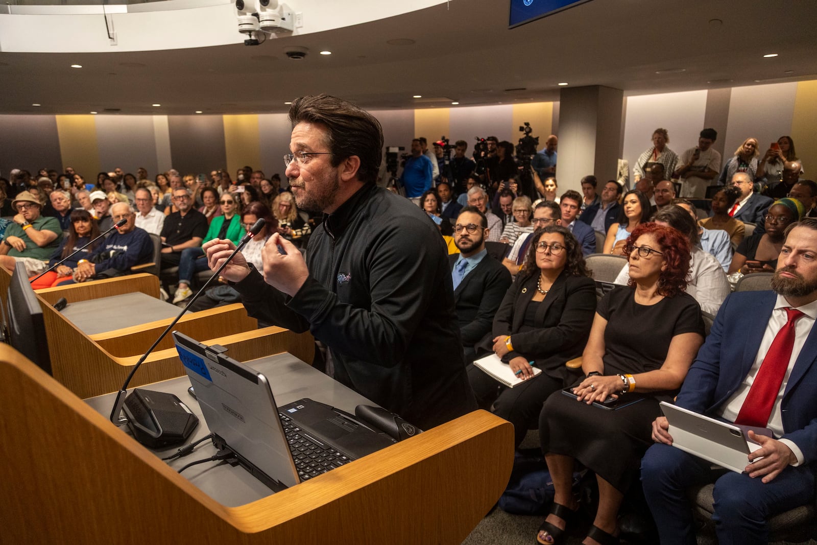 Filmmaker Billy Corben speaks in support of O Cinema during an extended public speaking portion as the City Commission was expected to discuss Mayor Steven Meiner's proposal to terminate a lease and cut financial support for O Cinema, the independent film theater on Wednesday, March 19, 2025 in Miami Beach, Fla. (Jose Iglesias /Miami Herald via AP)