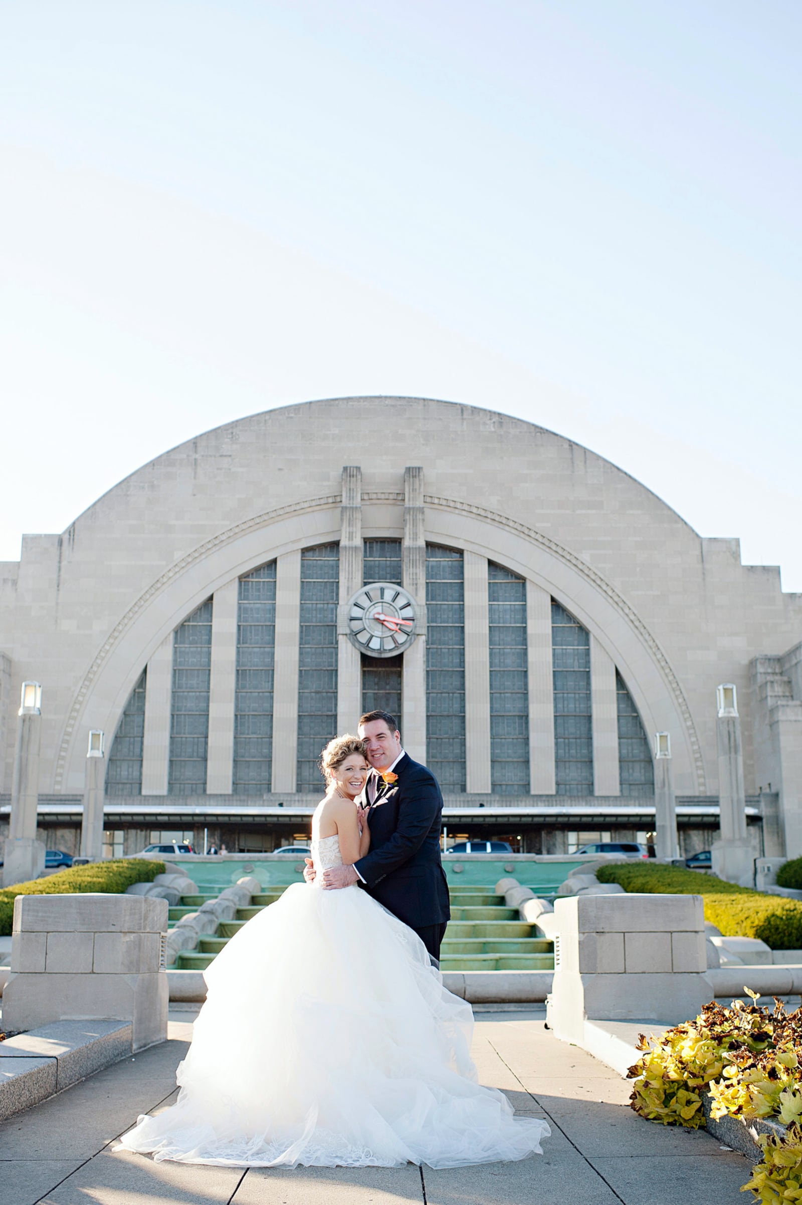 Emily Wall Perrich (L) and Mike Perrich on their wedding day in 2015. They were married at their favorite place in Cincinnati - the Museum Center.