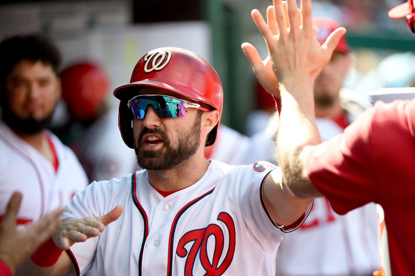 The Nationa’s Adam Eaton celebrates with teammates after scoring during the sixth inning of game one of a doubleheader against the Philadelphia Phillies at Nationals Park on September 24, 2019 in Washington, DC. (Photo by Will Newton/Getty Images)