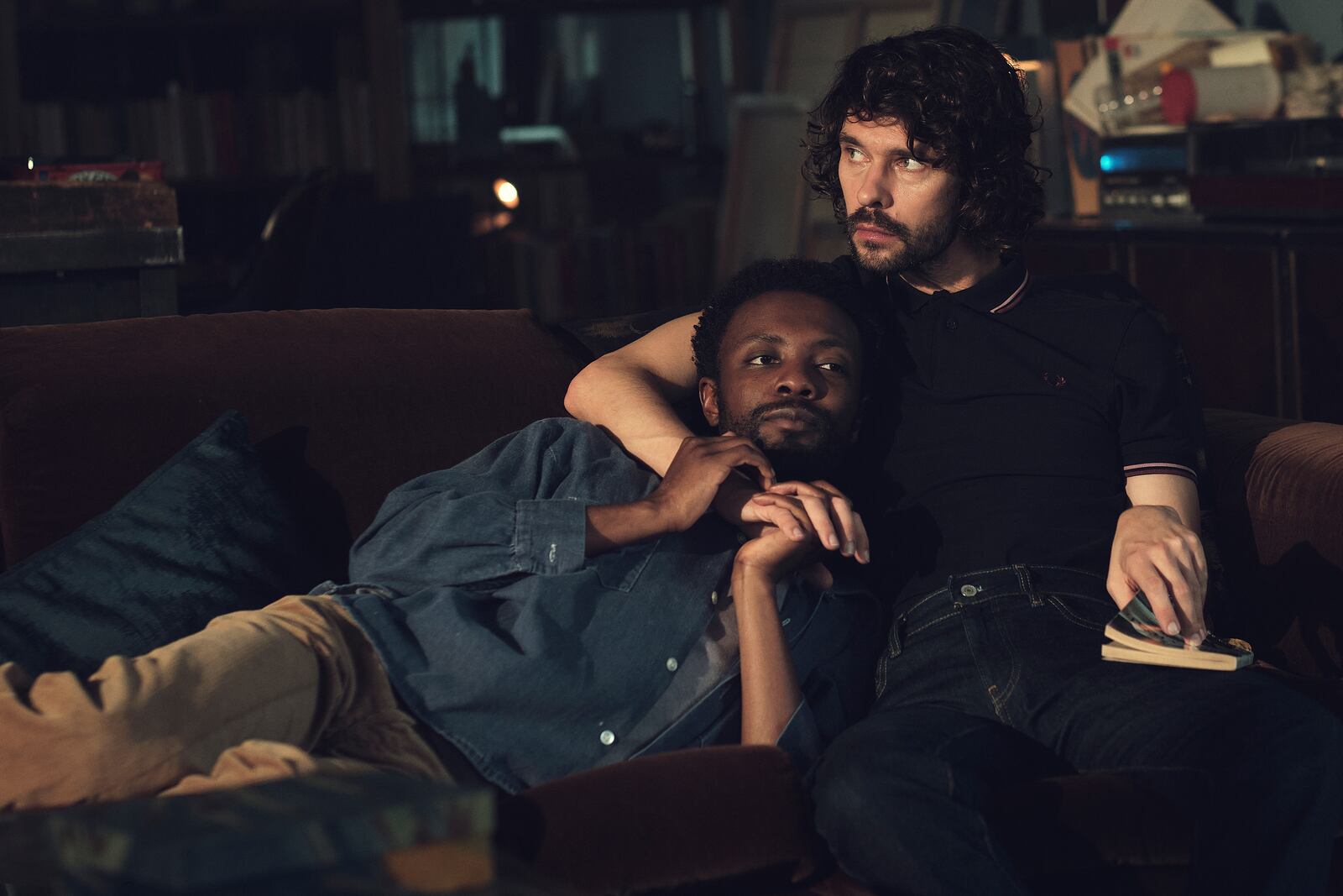 This image released by Netflix shows Omari Douglas, left, and Ben Whishaw in a scene from "Black Doves." (Ludovic Robert/Netflix via AP)