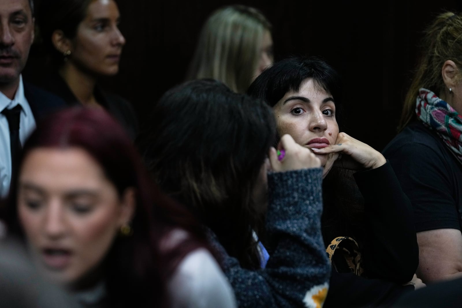 Yanina Maradona, daughter of late soccer star Diego Maradona, sits in court on the first day of a trial for alleged homicide by negligence against the medical team that treated her father, in San Isidro on the outskirts of Buenos Aires, Argentina, Tuesday, March 11, 2025. (AP Photo/Natacha Pisarenko)