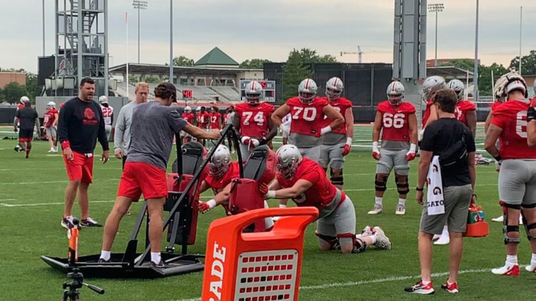 Ohio State offensive linemen hit the sled at football practice