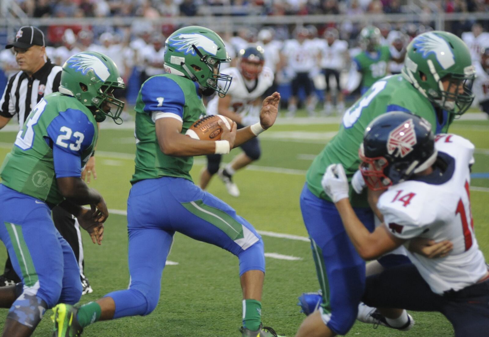 CJ quarterback Ryan Minor accounted for five touchdowns. CJ defeated visiting Piqua 42-22 in a Week 1 high school football game on Friday, Aug. 24, 2018. MARC PENDLETON / STAFF