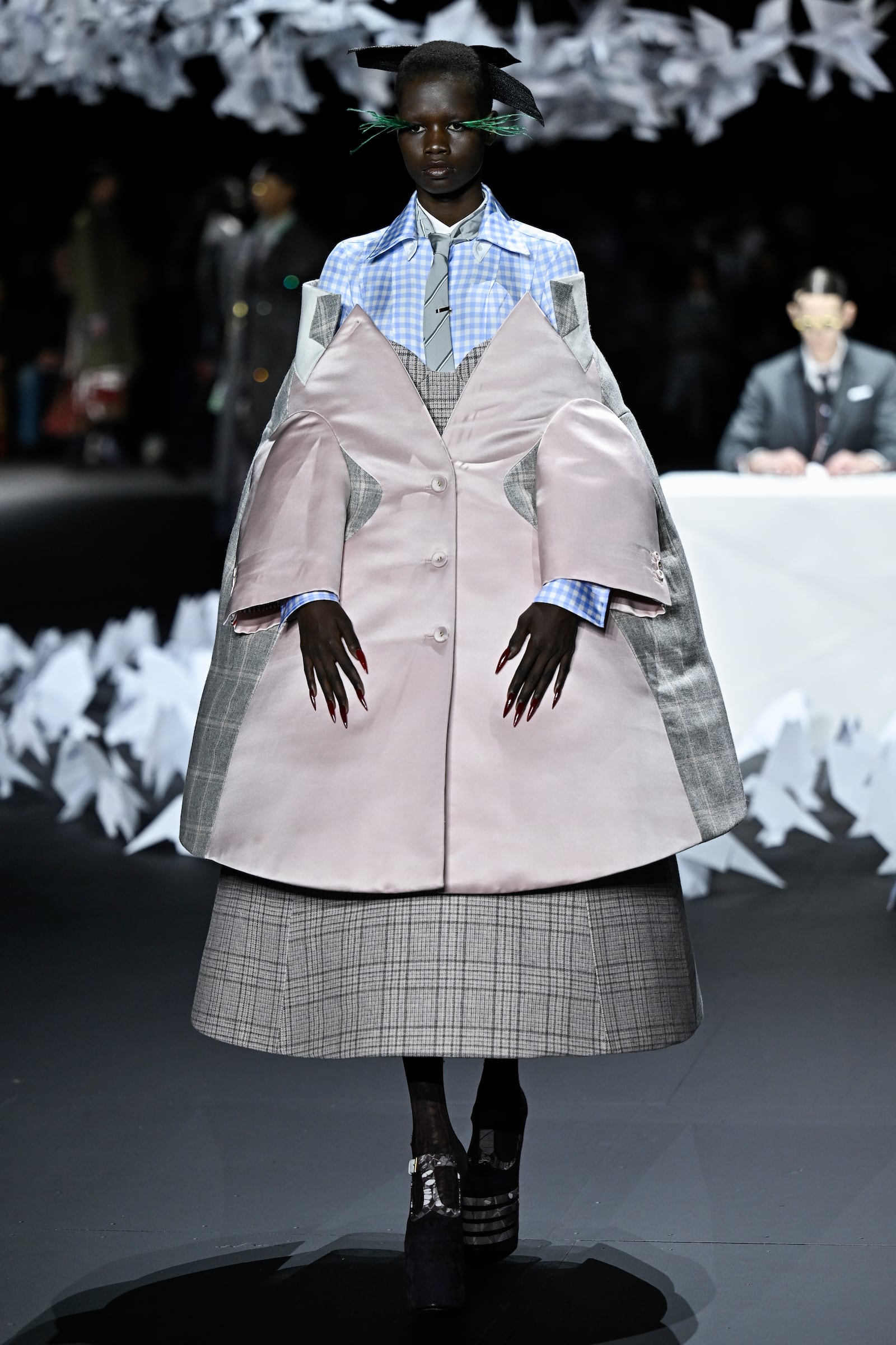 A model walks the runway during the Thom Browne Fall/Winter 2025 fashion show as part of New York Fashion Week on Tuesday, Feb. 11, 2025, at The Shed in New York. (Photo by Evan Agostini/Invision/AP)