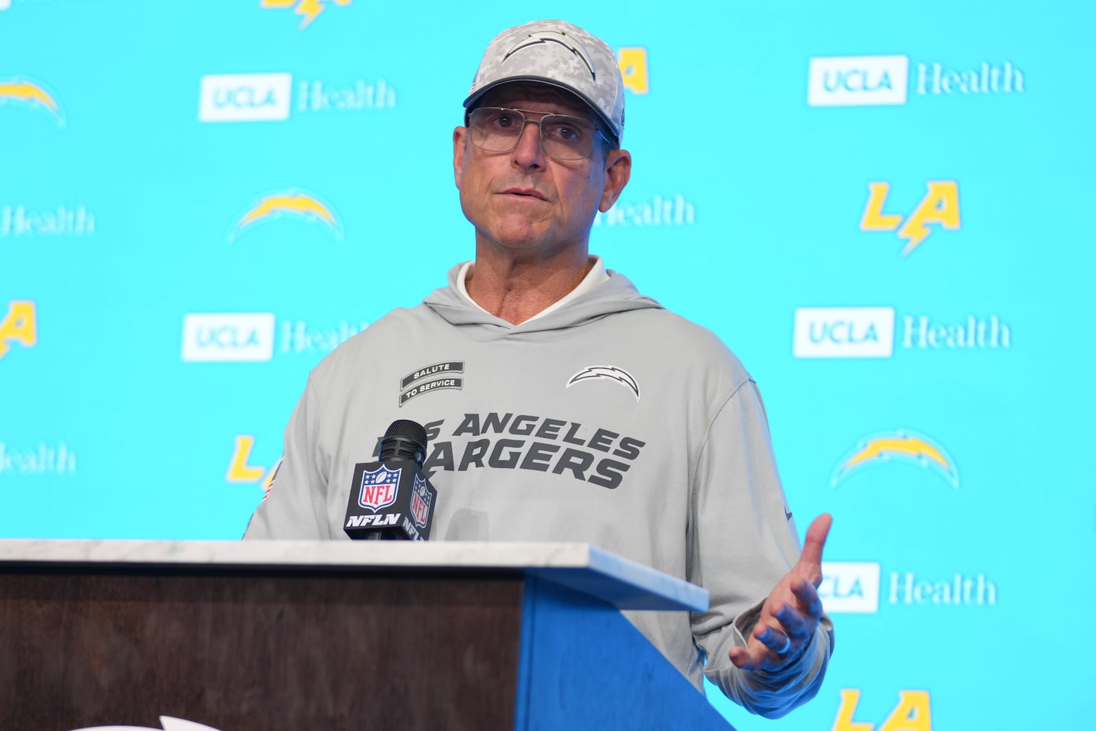 Los Angeles Chargers head coach Jim Harbaugh answers questions after an NFL football game against the Baltimore Ravens, Monday, Nov. 25, 2024, in Inglewood, Calif. (AP Photo/Eric Thayer)