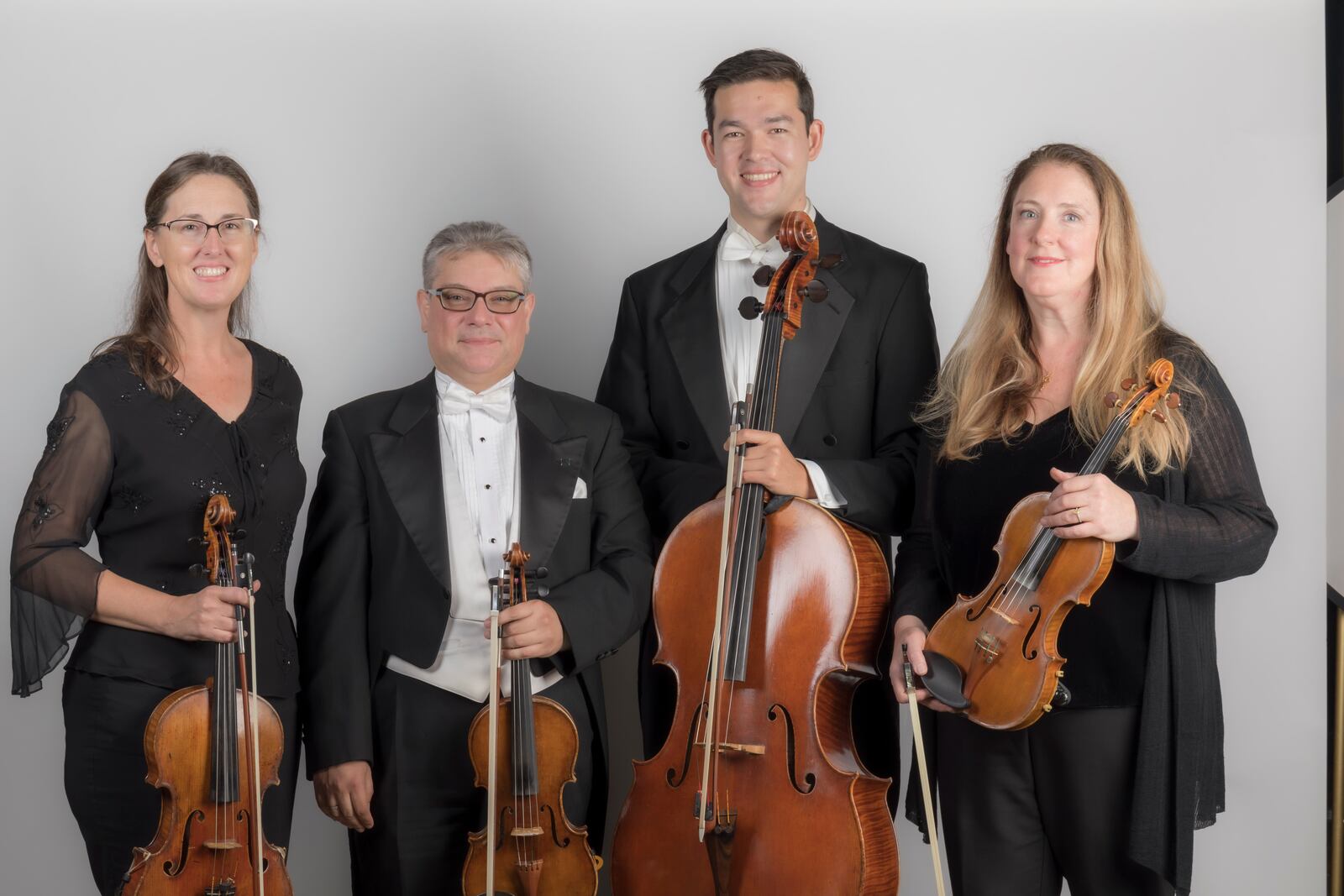 Dayton Philharmonic’s Principal String Quartet, (left to right) Sheridan Currie, Aurelian Oprea, John Kurokawa and Kirstin Greenlaw, perform in the Mimi and Stuart Rose Auditorium at Dayton Art Institute on Saturday, April 29.