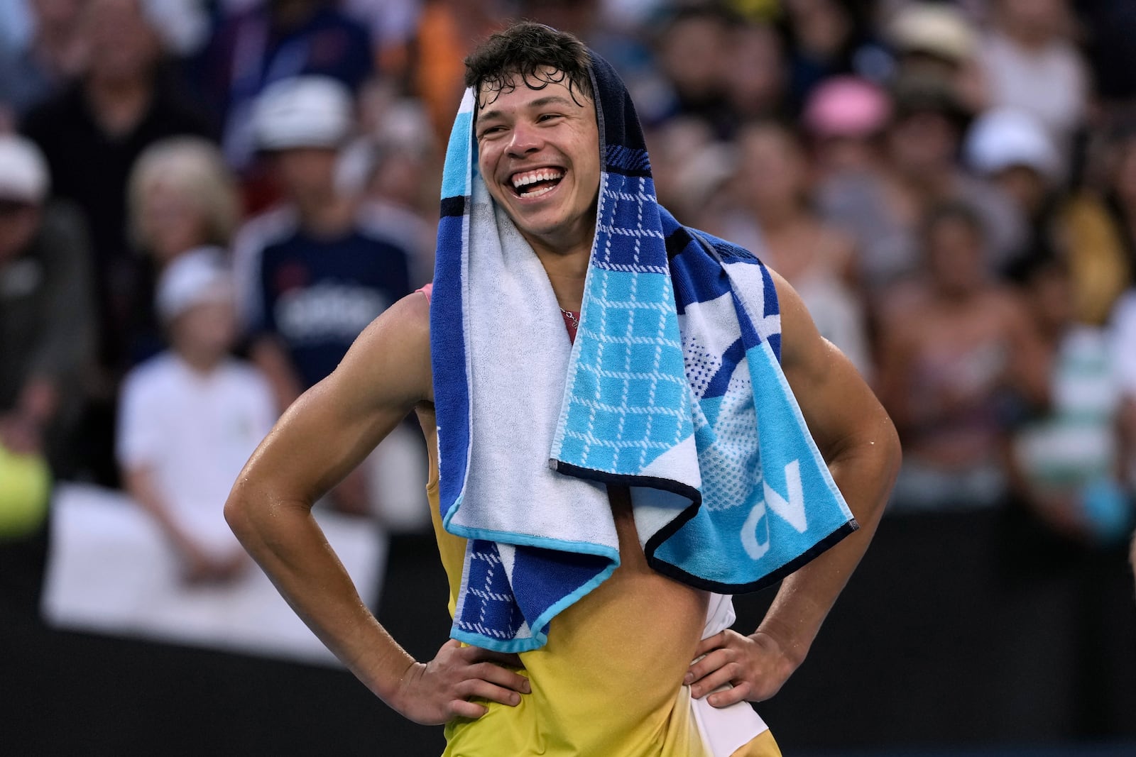 Ben Shelton of the U.S. reacts after defeating Lorenzo Musetti of Italy in their third round match at the Australian Open tennis championship in Melbourne, Australia, Saturday, Jan. 18, 2025. (AP Photo/Ng Han Guan)